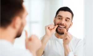 Choosing Water Floss vs Regular Floss